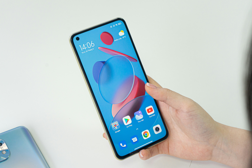 Person holding smartphone with colorful display